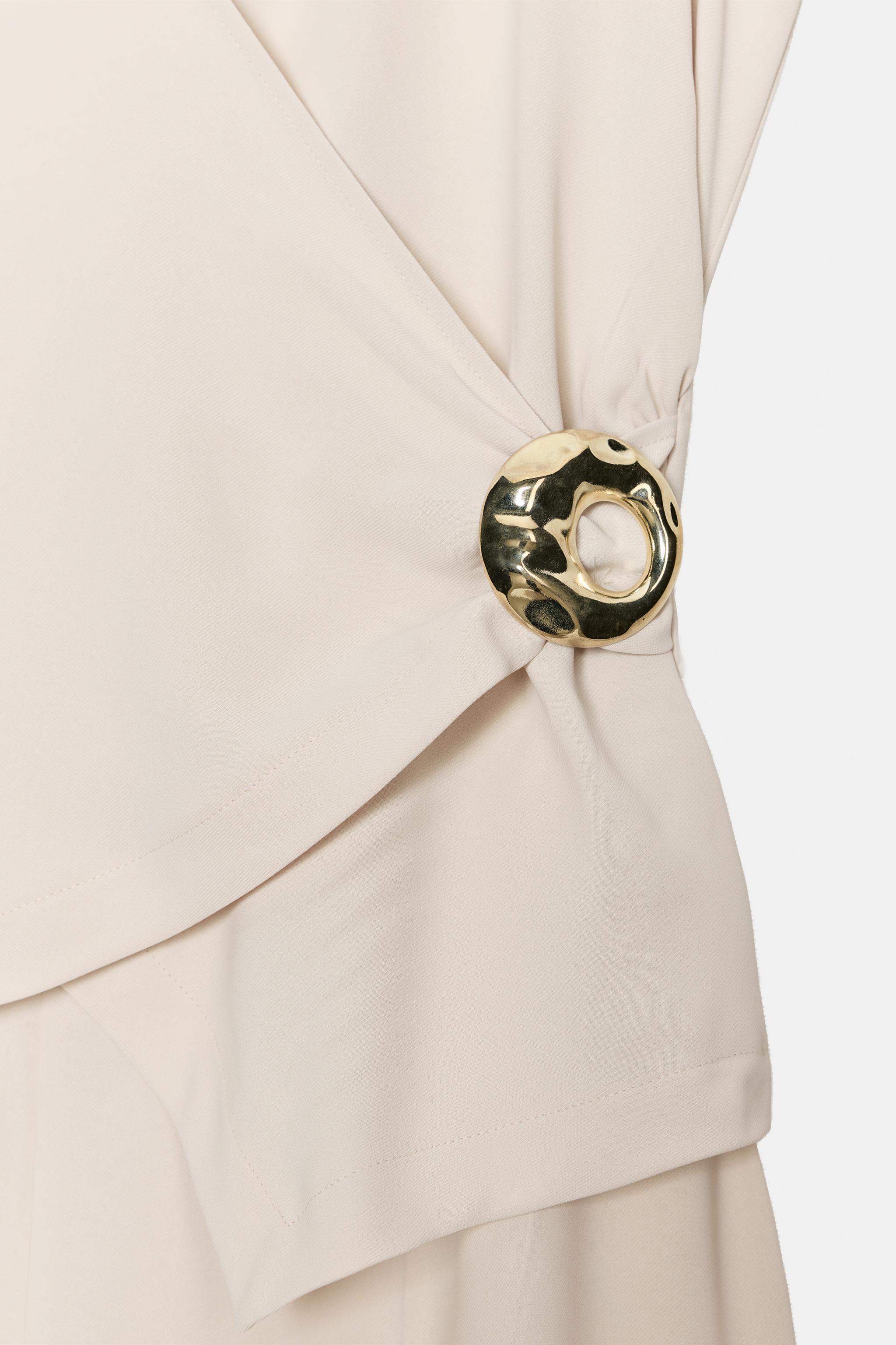 GOLD APPLIQUÉ JUMPSUIT